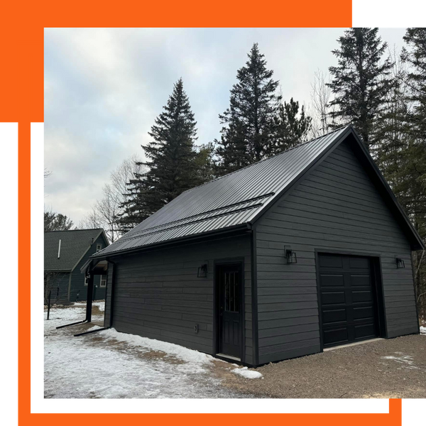 An image of a shed with a metal roof