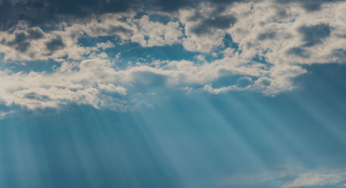 sun rays through the clouds