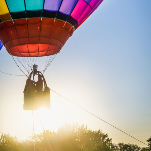 A hot air balloon tied to the ground 