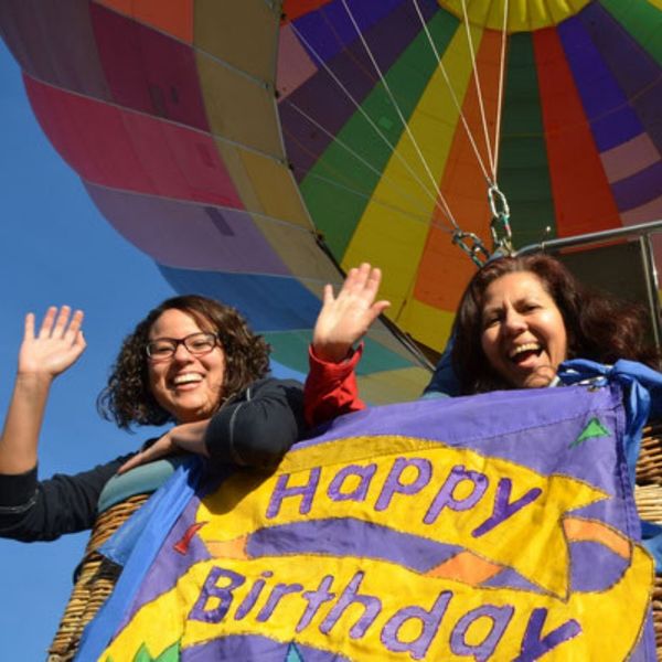 people celebrating a birthday in a hot air balloon