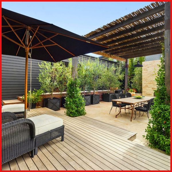 Newly finished deck with patio furniture and plants Planning Your Deck3.jpg