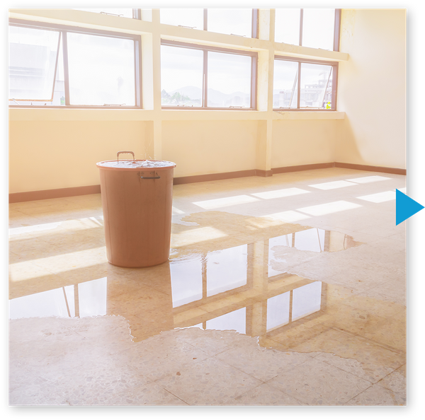 Pool of water on the floor of an office building