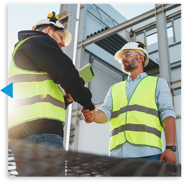 Contractor handshake outside of commercial building