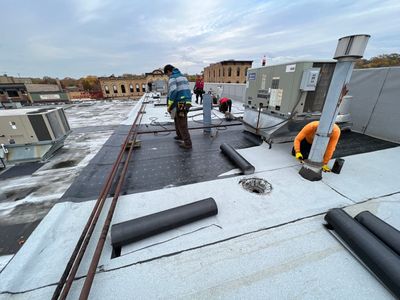 Working on commercial roof