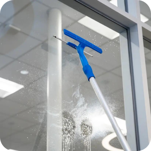 window cleaning with an extended squeegee