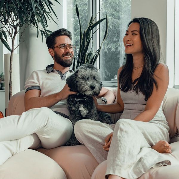 happy couple with their dog