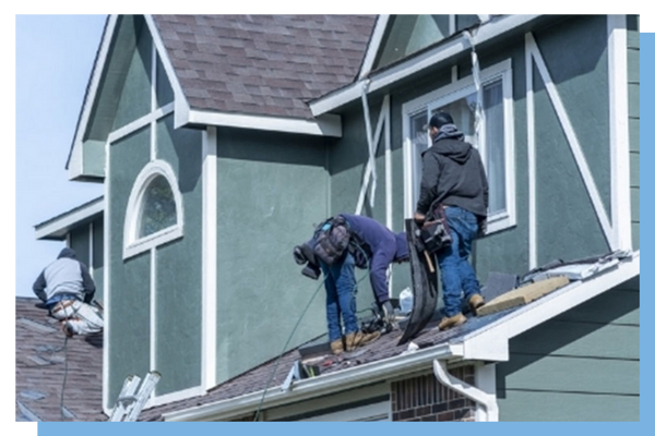 roofers working on roof