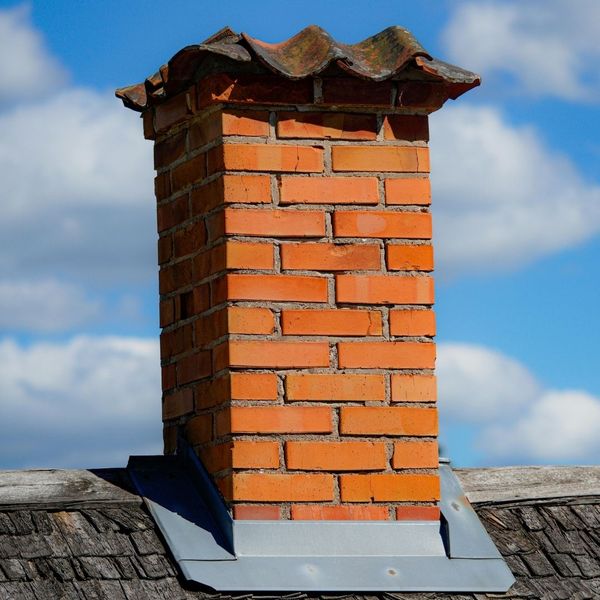 chimney with flashing around base