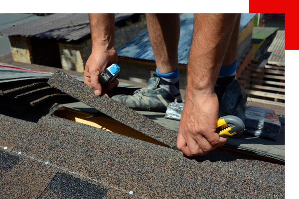 Roofer placing strips on top of roof
