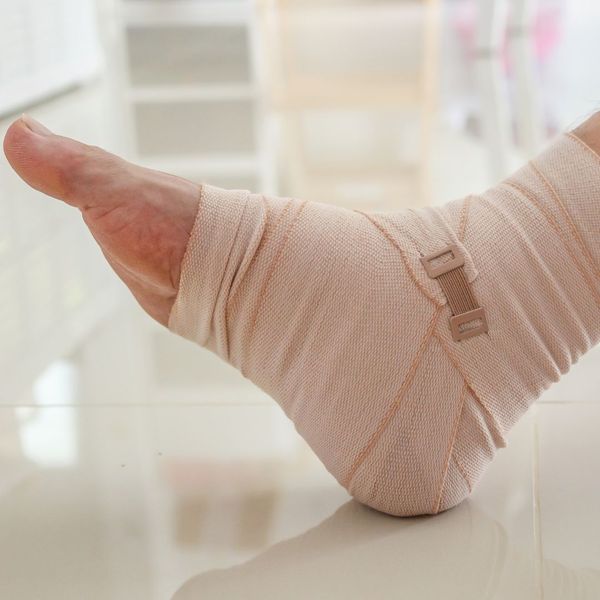 An ankle wrapped in guaze