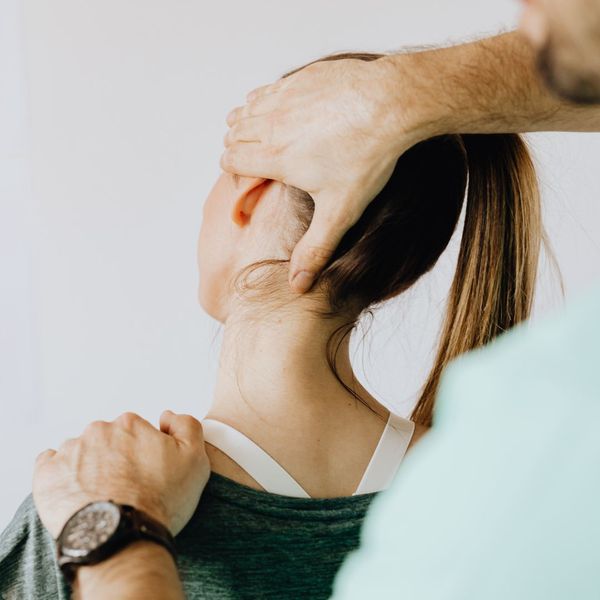 a person having their neck adjusted Why Chiropractic Care is Essential After a Car Accident (2).jpg