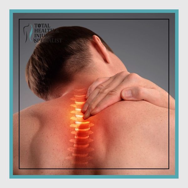 person feeling pain in spine