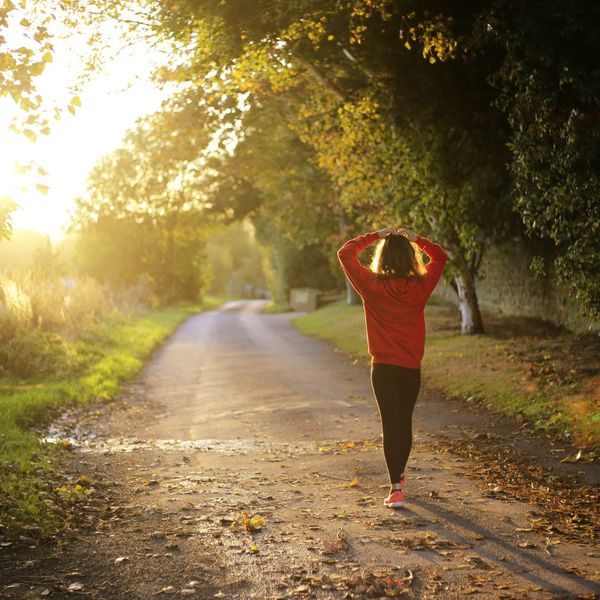 a person walking into the sunset Why Chiropractic Care is Essential After a Car Accident (4).jpg