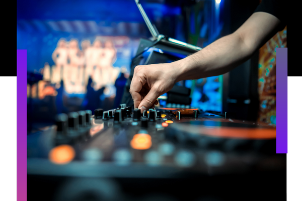 DJ working a live event in a restuarant Commercial Speakers 2.png