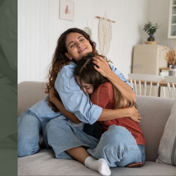 woman hugging her daughter