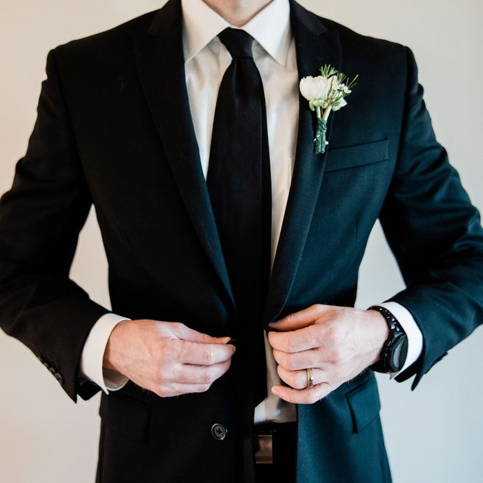 groom in a well tailored suit
