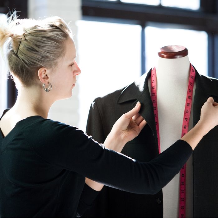 woman altering a suit