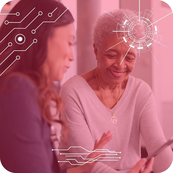 smiling patient looking at phone