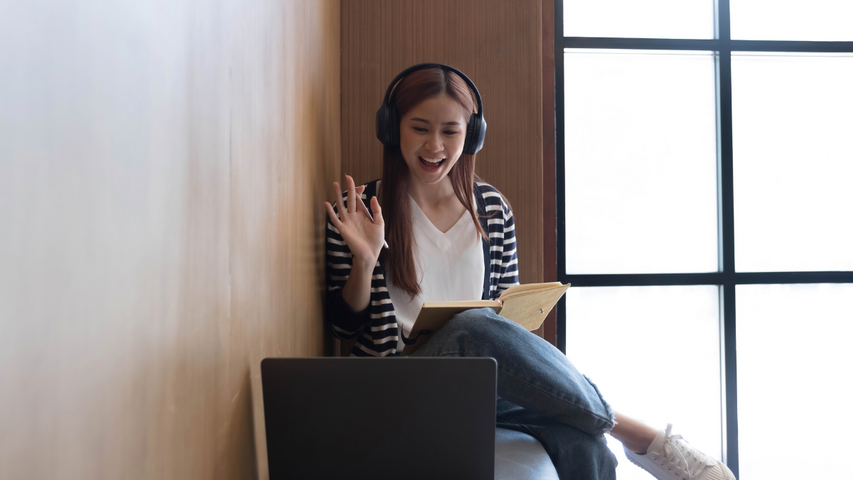 vecteezy_asian-woman-wearing-headphones-study-online-watching-webinar_8740865.png