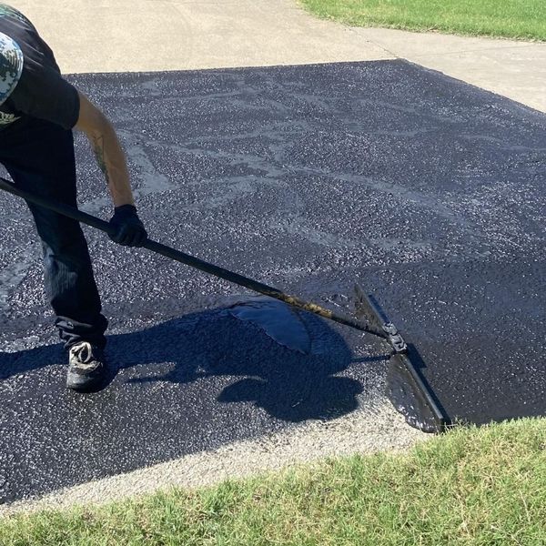 pavement being seal coated