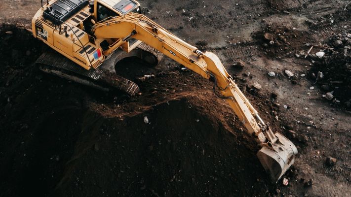 Heavy machinery digging up land Heavy machinery digging up land