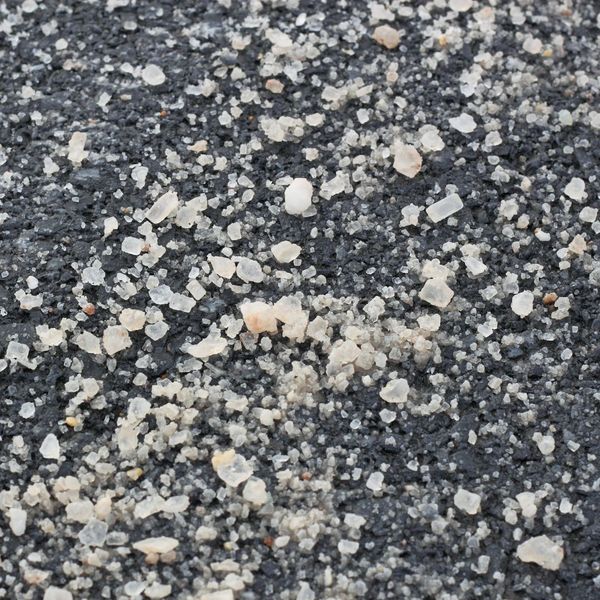 Concrete with de-icing product on it.