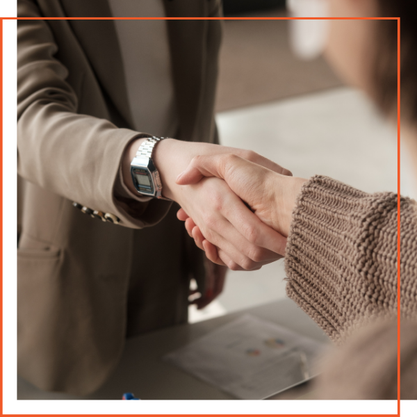 Two people shaking hands Two people shaking hands