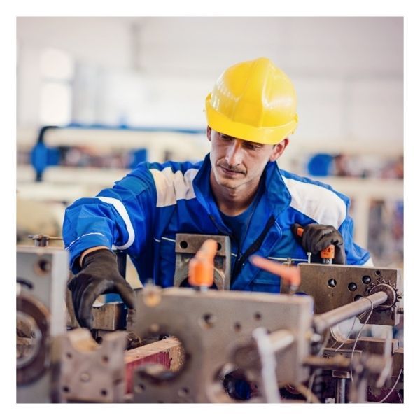 skilled trade worker working on machinery