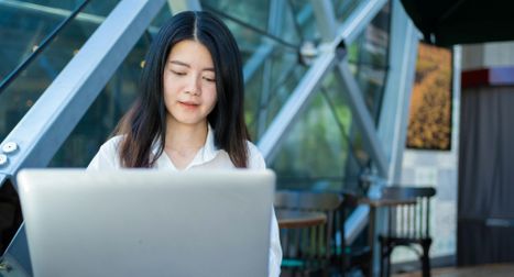 professional woman using laptop