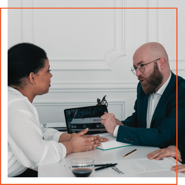 boss speaking with employee