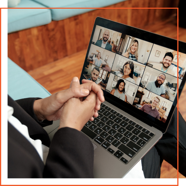 Person with their laptop on a video call Person with their laptop on a video call