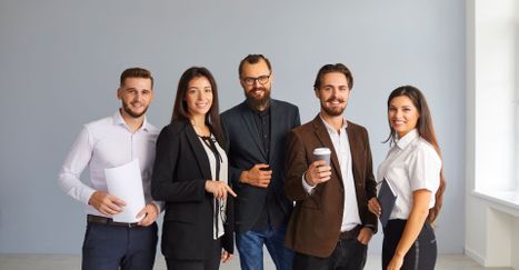 corporate employees standing together