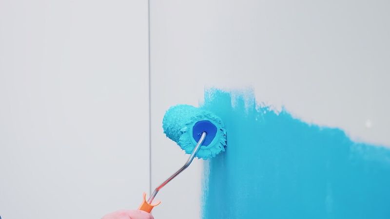roller-brush-wall-with-blue-paint-apartment-redecoration-home-construction-while-renovating-improving-repair-decorating_482257-3606.jpeg