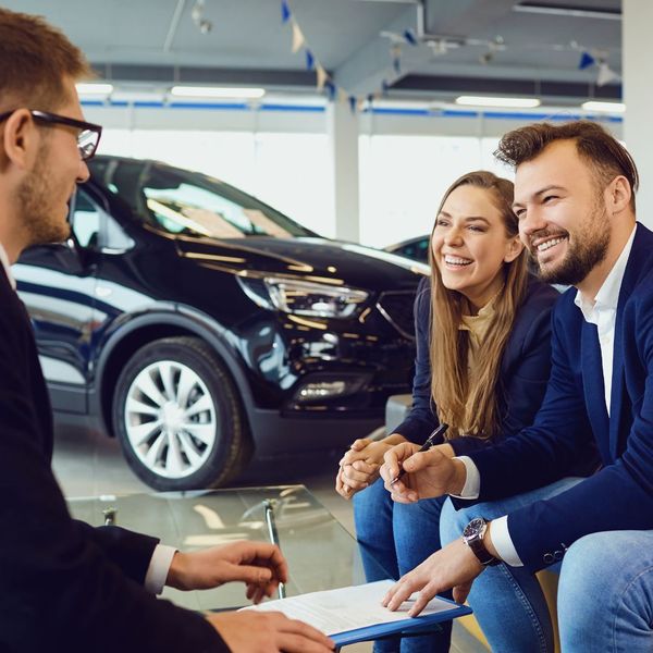 couple vehicle shopping