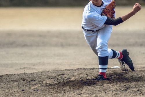 man throwing baseball