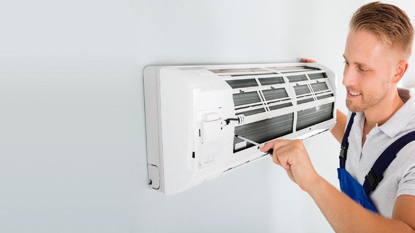 technician working on mini split