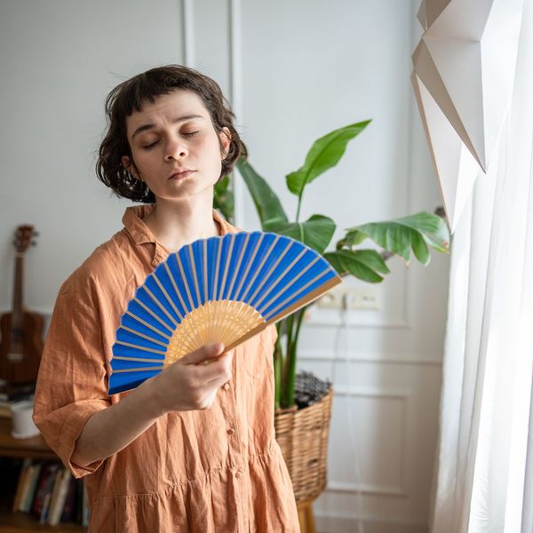 woman in hot living room