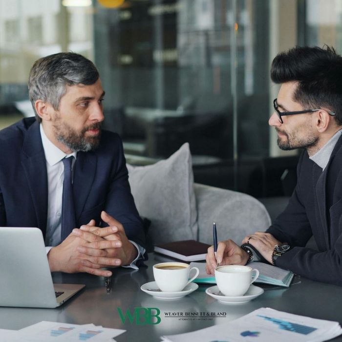 lawyer meeting with a client for estate planning