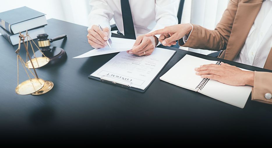 Lawyers looking at documents