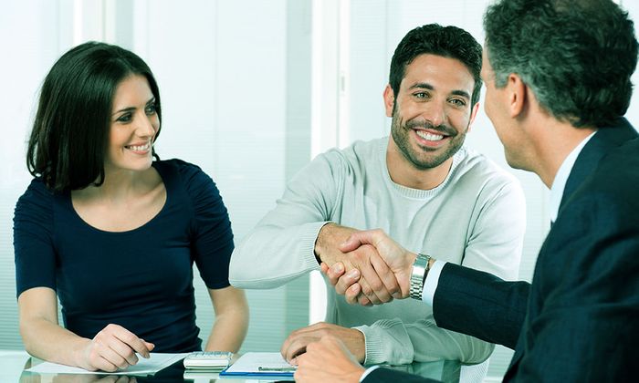 man shaking hands with lawyer