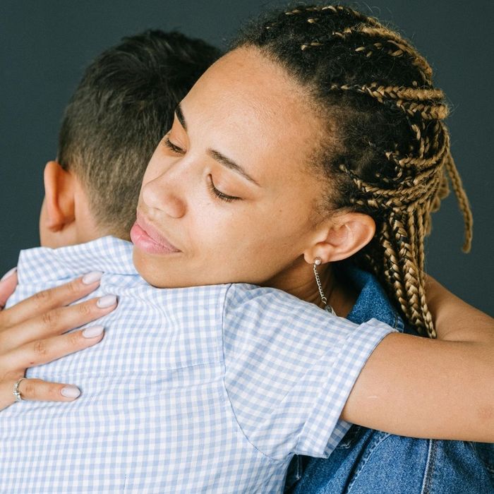 mother hugging her son