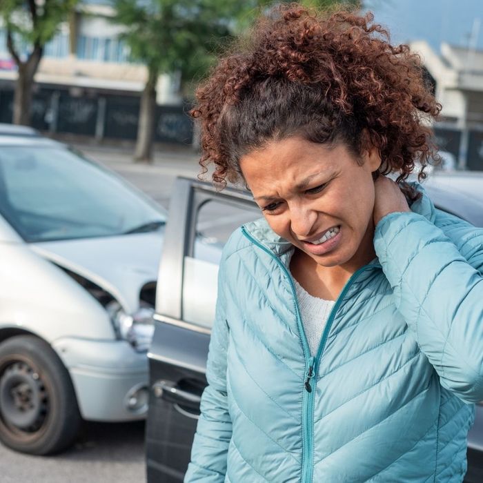 woman with neck pain after a fender bender