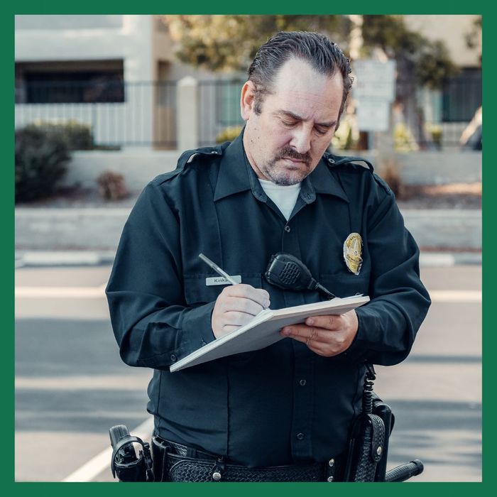 Officer writing a report