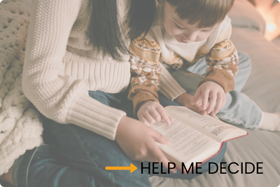 A high-angle, soft-focus shot of a parent and child sitting together on a bed, looking at an open book with the text "HELP ME DECIDE" overlaid at the bottom. A high-angle, soft-focus shot of a parent and child sitting together on a bed, looking at an open book with the text "HELP ME DECIDE" overlaid at the bottom.