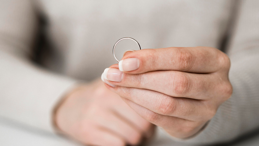 woman holding ring