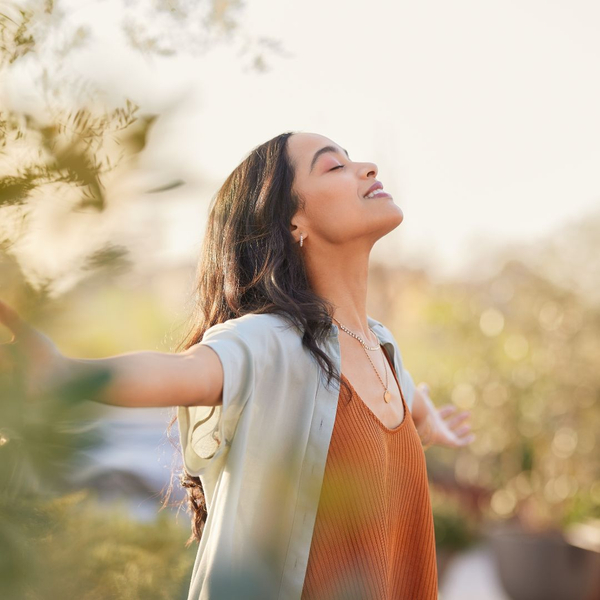 woman practicing mindfulness in nature