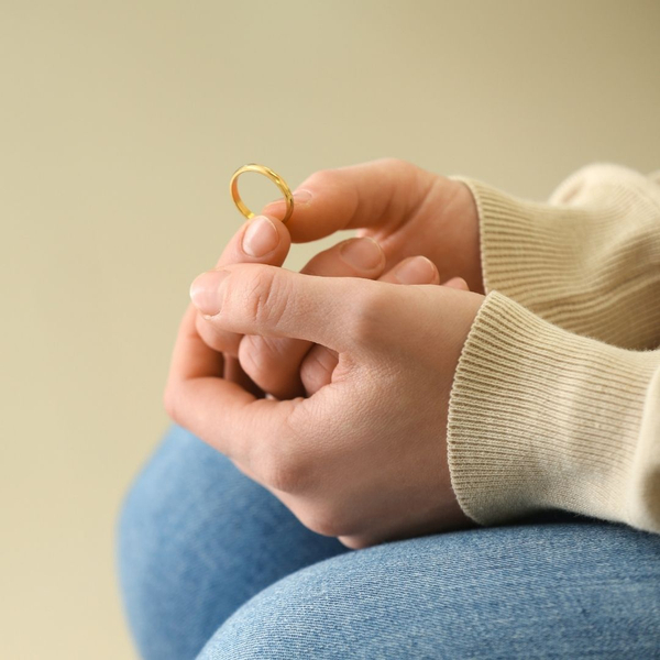 person holding ring