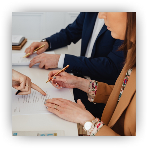 Woman signing papers