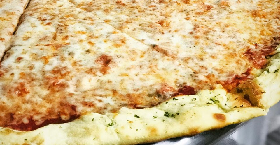 Close up of a New York style cheese pizza