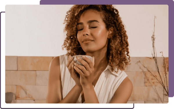 woman relaxing and drinking a cup of tea